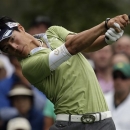 Ryo Ishikawa, of Japan, tees off on the fourth hole during the first round of the Masters golf tournament Thursday, April 11, 2013, in Augusta, Ga. (AP Photo/Charlie Riedel)