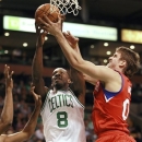 Boston Celtics' Jeff Green (8), center, and Philadelphia 76ers Spencer Hawes (00), right, vie for control of the ball during the first quarter of an NBA preseason basketball game at the TD Garden, in Boston, Sunday, Oct. 21, 2012. (AP Photo/Steven Senne)