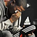 Chicago Bulls' Derrick Rose breaks down and cries during a news conference unveiling his new shoe the Adidas D Rose 3 in Chicago, Thursday, Sept. 13, 2012. (AP Photo/Paul Beaty)