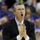 La Salle head coach John Giannini reacts to a call during the first half of a third-round game against Mississippi in the NCAA college basketball tournament, Sunday, March 24, 2013, in Kansas City, Mo. (AP Photo/Charlie Riedel)