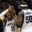 MEMPHIS, TN - MAY 13:  Mike Conley #11 and Zach Randolph #50 of the Memphis Grizzlies high-five as the Grizzlies defeat the Oklahoma City Thunder 103-97 in overtime to win Game Four of the Western Conference Semifinals of the 2013 NBA Playoffs at FedExForum on May 13, 2013 in Memphis, Tennessee.  (Photo by Jamie Squire/Getty Images)