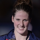 United States's Missy Franklin smiles as she holds the gold medal she won in the Women's 200m freestyle final at the FINA Swimming World Championships in Barcelona, Spain, Wednesday, July 31, 2013..(AP Photo/Manu Fernandez)