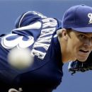 Milwaukee Brewers starting pitcher Zack Greinke throws during the first inning of a baseball game against the Chicago Cubs on Wednesday, June 6, 2012, in Milwaukee. (AP Photo/Morry Gash)