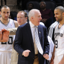 SAN ANTONIO, TX - March 1:  Gregg Popovich and Tony Parker #9 of the San Antonio Spurs talk during a time out during the game against the Sacramento Kings on March 1, 2013 at the AT&T Center in San Antonio, Texas