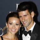 FILE - In this Feb. 6, 2012, file photo, tennis player Novak Djokovic, right, arrives with his then-girlfriend Jelena Ristic for the Laureus World Sports Awards in London. The top-ranked tennis player tweeted that he and his wife, Jelena, were celebrating the birth of their first child _ a boy named Stefan. 