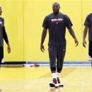 From left, Miami Heat guard Ray Allen, forward LeBron James and forward James Jones walk after finishing NBA basketball practice, Monday, Oct. 1, 2012, in Miami. In many ways, the Heat think they're picking up in training camp where they left off in June. And that's one of many reasons why confidence around the reigning NBA champions is high these days. (AP Photo/Wilfredo Lee)
