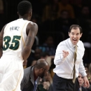 Baylor coach Scott Drew talks to Taurean Prince (35) during the first half of the NIT championship basketball game against Iowa on Thursday, April 4, 2013, in New York. (AP Photo/Frank Franklin II)