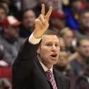 Iowa State head coach Fred Hoiberg calls a play against Ohio State in the first half of a third-round game of the NCAA college basketball tournament Sunday March 24, 2013, in Dayton, Ohio. (AP Photo/Skip Peterson)