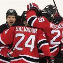 New Jersey Devils' Bryce Salvador celebrates with teammates after scoring a goal in the second period during Game 5 of the NHL hockey Stanley Cup finals, Saturday, June 9, 2012, in Newark, N.J.. (AP Photo/Frank Franklin II)