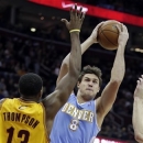 Denver Nuggets' Danilo Gallinari (8), from Italy, shoots over Cleveland Cavaliers' Tristan Thompson (13) in the first quarter of an NBA basketball game Saturday, Feb. 9, 2013, in Cleveland. (AP Photo/Mark Duncan)