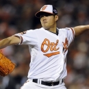 Baltimore Orioles starting pitcher Wei-Yin Chen, of Taiwan, throws to the New York Yankees in the second inning of Game 2 of the American League division baseball series on Monday, Oct. 8, 2012, in Baltimore. (AP Photo/Nick Wass)