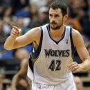 FILE - In this Jan. 16, 2012, file photo, Minnesota Timberwolves' Kevin Love reacts during the second half of an NBA basketball game against the Sacramento Kings in Minneapolis. Love will miss the next six to eight weeks after breaking his right hand in a workout on Wednesday, Oct. 17, 2012. (AP Photo/ Jim Mone, File)