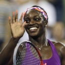 Sloane Stephens, of the United States, waves after defeating Urszula Radwanska of Poland, during the second round of the 2013 U.S. Open tennis tournament, early Thursday, Aug. 29, 2013, in New York. Stephens won 6-1, 6-1. (AP Photo/Charles Krupa)