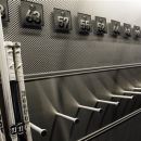 A nearly empty hockey stick rack in the Buffalo Sabres locker room is shown at the First Niagara Center, home of the Buffalo Sabres NHL hockey team, in Buffalo, N.Y., Tuesday, Sept. 25, 2012. The NHL and its union are to return to the bargaining table Friday, the first negotiations since the lockout began Sept. 15. (AP Photo/David Duprey)