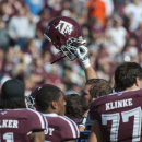 Texas A&M players huddle up before an NCAA college football game against Sam Houston State, Saturday, Nov. 17, 2012, in College Station, Texas. (AP Photo/Dave Einsel)