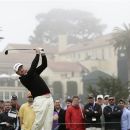 Graeme McDowell, of Northern Ireland, hits a drive on the fourth hole during the fourth round of the U.S. Open Championship golf tournament Sunday, June 17, 2012, at The Olympic Club in San Francisco. (AP Photo/Eric Gay)