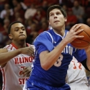 Creighton's Doug McDermott (3) looks for room to shoot past Illinois State's Zeke Upshaw (24) during the first half of an NCAA college basketball game at Redbird Arena Wednesday, Jan. 2, 2013, in Normal, Ill. (AP Photo/ Stephen Haas)