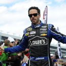 Jimmie Johnson greets fans during driver introductions before the NASCAR Sprint Cup series auto race at Texas Motor Speedway in Fort Worth, Texas, Sunday, Nov. 3, 2013. (AP Photo/Ralph Lauer)