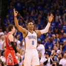 OKLAHOMA CITY, OK - APRIL 24:  Russell Westbrook #0 of the Oklahoma City Thunder celebrates after scoring against the Houston Rockets during the fourth quarter of Game Two of the Western Conference Quarterfinals of the 2013 NBA Playoffs at Chesapeake Energy Arena on April 24, 2013 in Oklahoma City, Oklahoma. The Thunder defeated the Rockets 105-102. (Photo by Christian Petersen/Getty Images)
