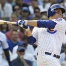 Chicago Cubs' Anthony Rizzo hits a two-run home run against the Houston Astros during the fifth inning of a baseball game in Chicago, Saturday, June 30, 2012. (AP Photo/Nam Y. Huh)