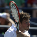 Robin Haase, of the Netherlands, follows through on a shot against Andy Murray, of the United Kingdom, during the opening round of the 2014 U.S. Open tennis tournament, Monday, Aug. 25, 2014, in New York. (AP Photo/Kathy Willens)