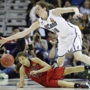 Connecticut forward Breanna Stewart (30) dives for a loose ball against Louisville guard Jude Schimmel (22) during the second half of the national championship game of the women's Final Four of the NCAA college basketball tournament, Tuesday, April 9, 2013, in New Orleans. (AP Photo/Gerald Herbert)