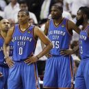 Oklahoma City Thunder players, Derek Fisher, Russell Westbrook, Kevin Durant, James Harden, from left, react at a break against the Miami Heat during the second half at Game 4 of the NBA finals basketball series, Tuesday, June 19, 2012, in Miami. The Heat won 104-98.  (AP Photo/Lynne Sladky)