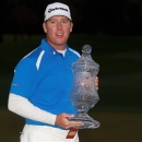 D.A. Points poses with the championship trophy after winning the Houston Open golf tournament, Sunday, March 31, 2013 in Humble, Texas. (AP Photo/Patric Schneider)