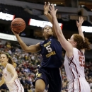 West Virginia' Averee Fields (5) goes up for a shot as Oklahoma's Joanna McFarland (53) defends in the first half of an NCAA college basketball game in the Big 12 women's tournament Saturday, March 9, 2013, in Dallas. (AP Photo/Tony Gutierrez)