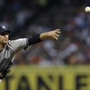New York Yankees starting pitcher Andy Pettitte throws during the second inning of a baseball game against the Houston Astros Saturday, Sept. 28, 2013, in Houston. (AP Photo/David J. Phillip)