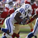 Indianapolis Colts running back Ahmad Bradshaw (44) runs for a one-yard touchdown against the San Francisco 49ers during the fourth quarter of an NFL football game in San Francisco, Sunday, Sept. 22, 2013. (AP Photo/Ben Margot)
