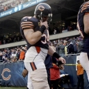In this Dec. 2, 2012, photo, Chicago Bears linebacker Brian Urlacher walks off the field following their 23-17 overtime loss to the Seattle Seahawks in an NFL football game in Chicago. Urlacher's status for this Sunday's game against the Minnesota Vikings and beyond is in question after he was injured on the final drive of their game against the Seahawks. The Chicago Tribune, citing sources, reported Tuesday, Dec. 4, that he is expected to miss three games and possibly the rest of the regular season. (AP Photo/Nam Y. Huh)