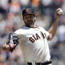 San Francisco Giants pitcher Barry Zito throws against the Oakland Athletics during the second inning of a baseball game in San Francisco, Thursday, May 30, 2013. (AP Photo/Jeff Chiu)