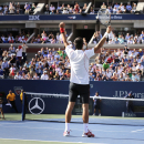 Novak Djokovic, of Serbia, reacts to the crowd after defeating Stanislas Wawrinka, of Switzerland, during the semifinals of the 2013 U.S. Open tennis tournament, Saturday, Sept. 7, 2013, in New York. (AP Photo/Charles Krupa)