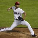 Texas Rangers' Yu Darvish of Japan delivers to the Seattle Mariners in the fifth inning of a baseball game Friday, Sept. 14, 2012, in Arlington, Texas. (AP Photo/Tony Gutierrez)
