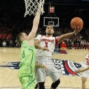 Louisville's Peyton Siva (3) drives past Notre Dame's Pat Connaughton (24) during the first half of an NCAA college basketball game at the Big East Conference tournament Friday, March 15, 2013, in New York. (AP Photo/Frank Franklin II)