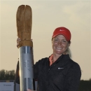 Suzann Pettersen of Norway holds the trophy during the LPGA Championship golf tournament at Sky72 Golf Club in Incheon, west of Seoul, South Korea, Sunday, Oct. 21, 2012. (AP Photo/Lee Jin-man)