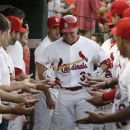 St. Louis Cardinals' Carlos Beltran (3) celebrates with teammates after hitting a solo home run in the third inning of a baseball game against the Chicago White Sox, Wednesday, June 13, 2012, in St. Louis.(AP Photo/Tom Gannam)