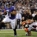 Baltimore Ravens running back Ray Rice, left, rushes past Cincinnati Bengals defensive tackle Domata Peko for a touchdown in the first half of an NFL football game in Baltimore, Monday, Sept. 10, 2012. (AP Photo/Nick Wass)