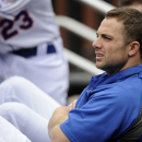 New York Mets' David Wright watches from the dugout during the second inning of an interleague baseball game against the Kansas City Royals Saturday, Aug. 3, 2013 at Citi Field in New York. (AP Photo/Bill Kostroun)