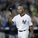 New York Yankees relief pitcher Mariano Rivera (42) tips his cap in the ninth inning of his final appearance in a baseball game at Yankee Stadium, against the Tampa Bay Rays on Thursday, Sept. 26, 2013, in New York. The Yankees won 4-0. (AP Photo/Kathy Willens)