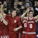 Indiana forward Will Sheehey (0) reacts with teammates on the bench during the first half of an NCAA college basketball game against Iowa, Monday, Dec. 31, 2012, in Iowa City, Iowa. (AP Photo/Charlie Neibergall)