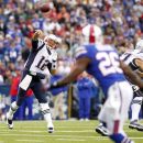 New England Patriots' Tom Brady throws during the first quarter of an NFL football game against the Buffalo Bills in Orchard Park, N.Y., Sunday, Sept. 30, 2012. (AP Photo/Bill Wippert)