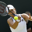 Marina Erakovic of New Zealand returns to Laura Robson of Britain during their Women's singles match at the All England Lawn Tennis Championships in Wimbledon, London, Saturday, June 29, 2013. (AP Photo/Kirsty Wigglesworth)