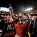 Alabama head coach Nick Saban acknowledges the fans after the BCS National Championship college football game against Notre Dame Monday, Jan. 7, 2013, in Miami. Alabama won 42-14. (AP Photo/David J. Phillip)