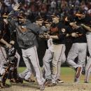 The Baltimore Orioles celebrate winning the American League wild-card playoff baseball game against the Texas Rangers, 5-1, Friday, Oct. 5, 2012 in Arlington, Texas. (AP Photo/Tony Gutierrez)