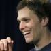 New England Patriots quarterback Tom Brady laughs during a news conference at Gillette Stadium in Foxborough, Mass., Thursday, Jan. 26, 2012. The Patriots are scheduled to face the New York Giants in the Super Bowl on Feb. 5 in Indianapolis.