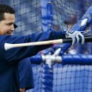 Detroit Tigers' Miguel Cabrera points to fans during batting practice before a baseball game with the Kansas City Royals at Kauffman Stadium in Kansas City, Mo., Wednesday, Oct. 3, 2012. (AP Photo/Orlin Wagner)