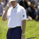Ernie Els, of South Africa, reacts after missing a putt on the second hole during the third round of the U.S. Open Championship golf tournament Saturday, June 16, 2012, at The Olympic Club in San Francisco. (AP Photo/Eric Risberg)