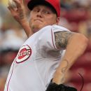 Cincinnati Reds starting pitcher Mat Latos throws to a Pittsburgh Pirates batter in the first inning of a baseball game, Friday, Aug. 3, 2012, in Cincinnati. (AP Photo/Al Behrman)